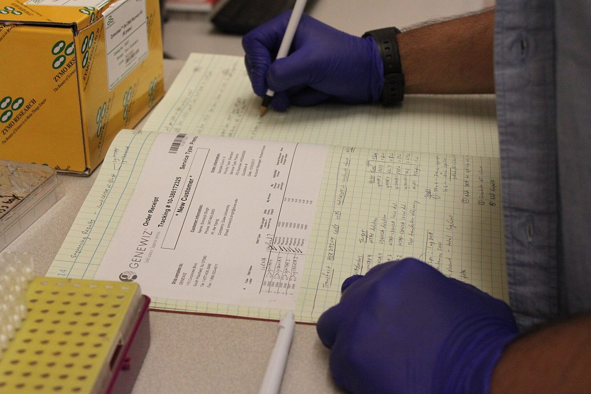 A handwritten laboratory notebook